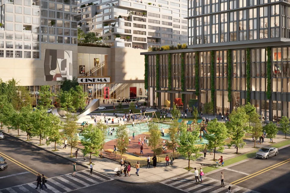 Rendering of Innovation QNS with landscaped open public space on corner and glass-clad building
